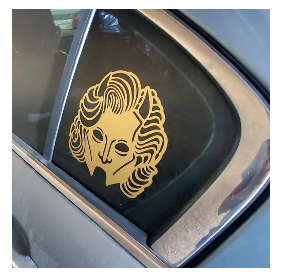 Gold gouleh decal on a car window