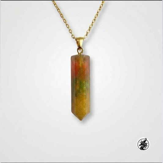 A gold chain necklace with a rectangular point pendant made of a translucent, multi-colored stone showing shades of orange, red, green, and yellow, displayed against a light gray background.