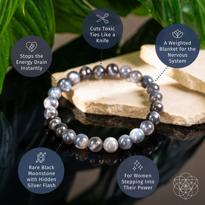 The Empath’s Cord Cutter – Black Moonstone Bracelet by Conscious Items is displayed on a natural surface with plant leaves, featuring text bubbles highlighting its benefits: energetic boundary protection, nervous system support, and empowering new beginnings.