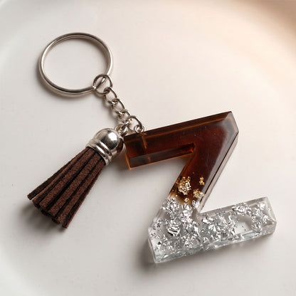 Keychain with tassel and decorative number 'Z' on a light background