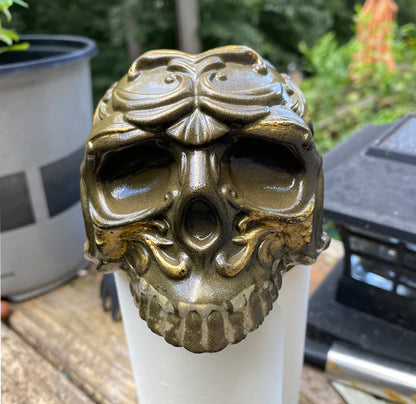 Decorative resin skull with intricate design
