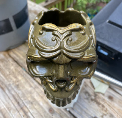 Decorative resin skull with intricate design