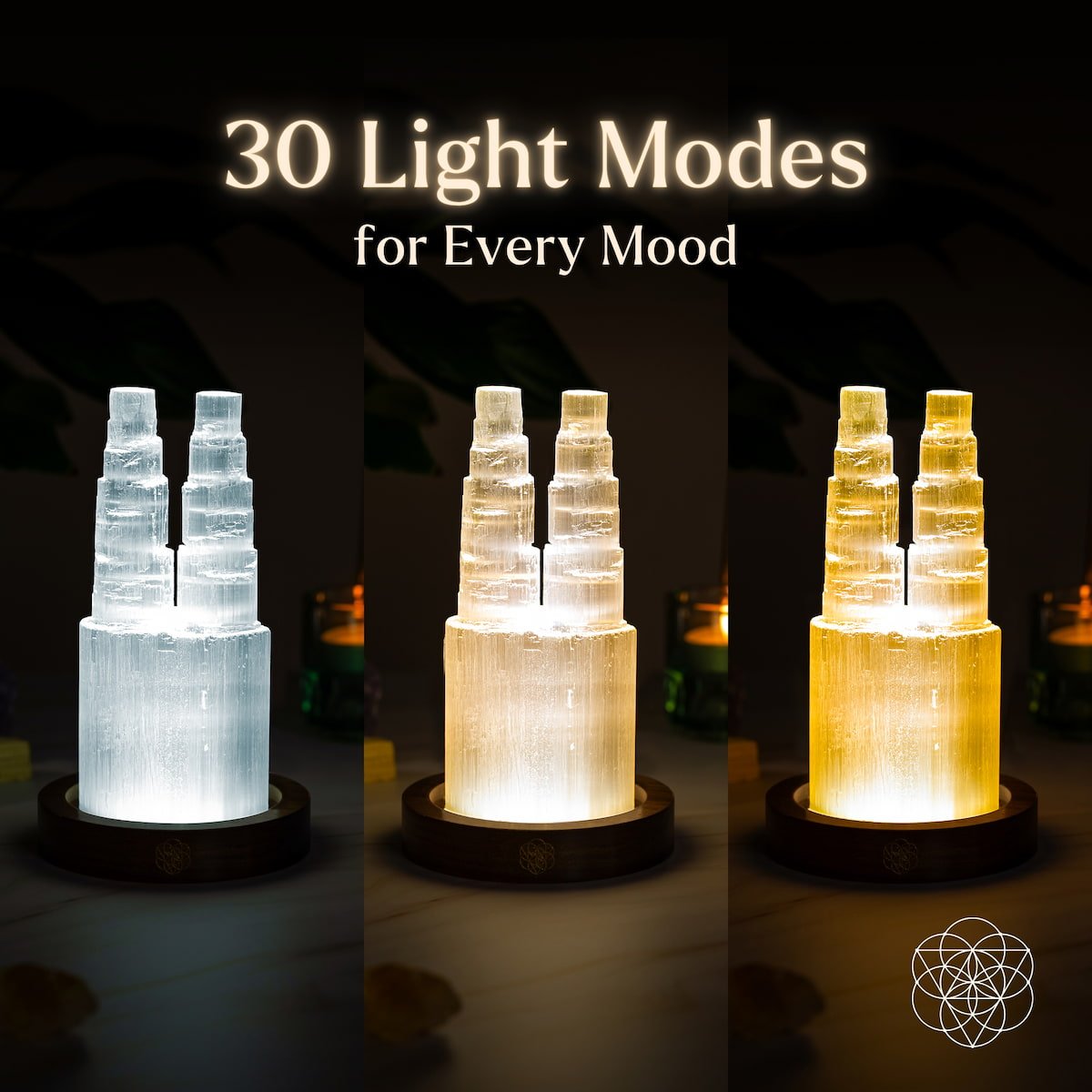 The Conscious Items Two-Tower Selenite Lamp shines with cool, neutral, and warm light modes. “30 Light Modes for Every Mood” is displayed above. Candles and crystals for crystal cleansing appear blurred in the background.